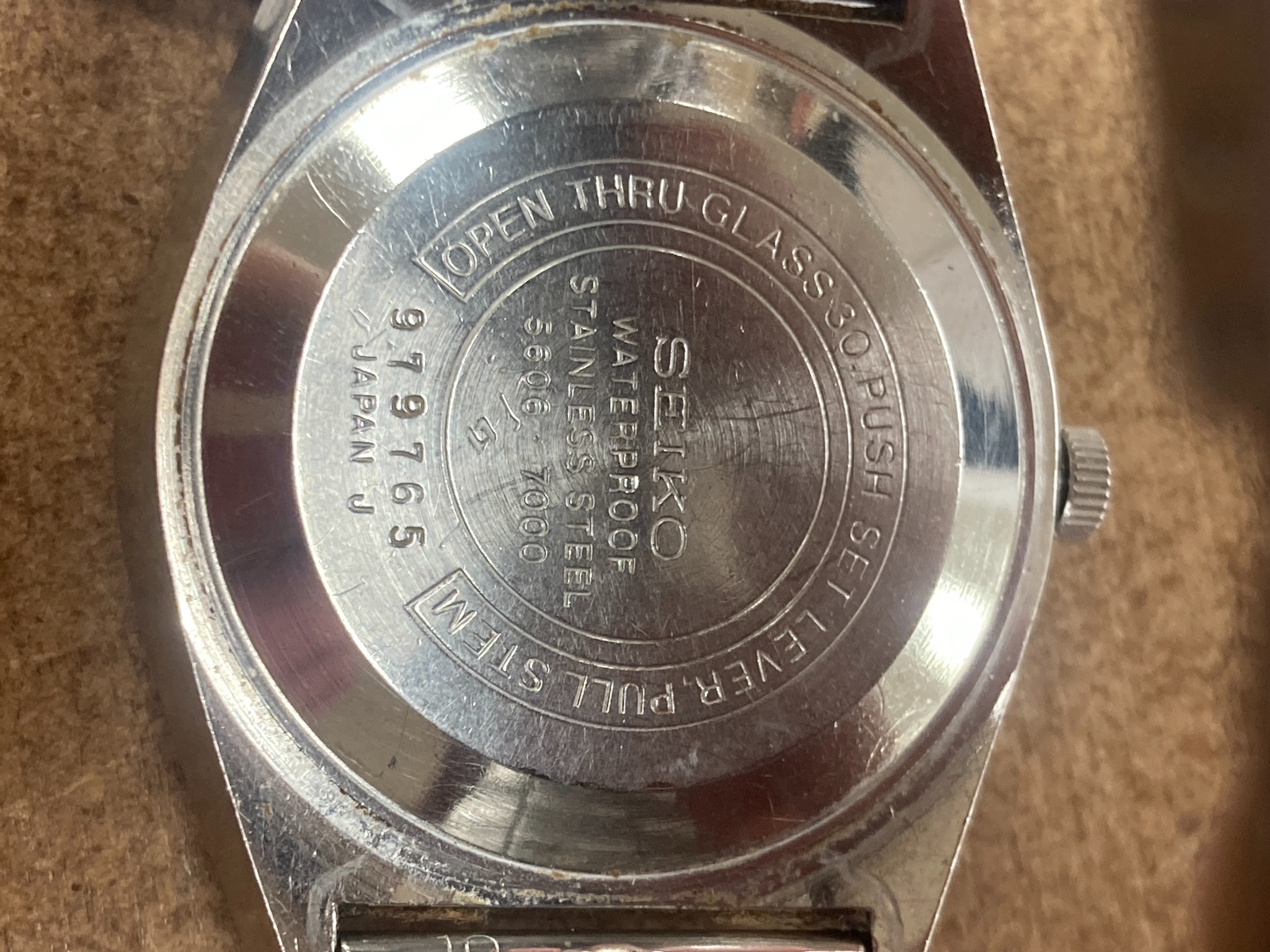 A gentleman's 1980's stainless steel Seiko Lord Matic day date wrist watch, on associated strap, model 5606 7000, cased diameter 36mm, with Seiko box.